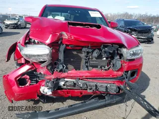 2016 Toyota Tacoma SR5 with VIN 3TMDZ5BN9GM012720, listed as a IAAI auction lot 41664651 with 119,010 mi miles and . Bid and sale history available at DreamBid. Image 6.