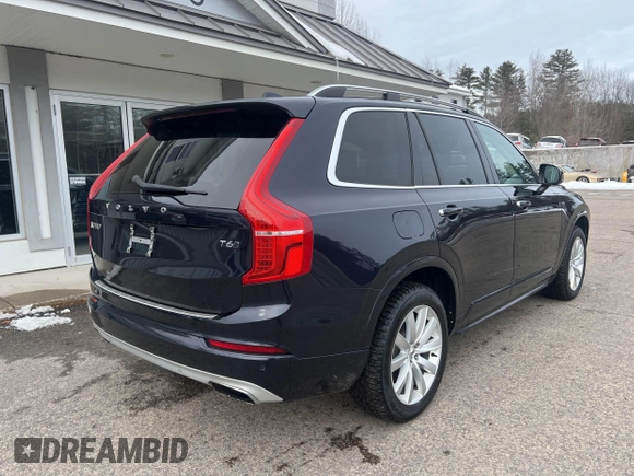 2017 Volvo XC90 Momentum with VIN YV4A22PK4H1122879, listed as a IAAI auction lot 41604685 with 164,460 mi miles. Bid and sale history available at carsss.com. Image 4.