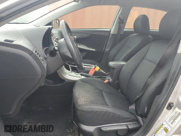 2010 Toyota Corolla with VIN 1NXBU4EE1AZ377581, listed as a Copart auction lot 52578805 with 242,776 mi miles and Salvage Title. Bid and sale history available at DreamBid. Image 7.