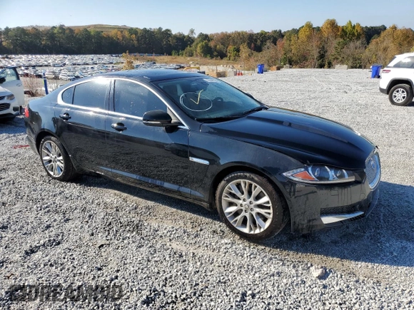 2014 Jaguar XF SC with VIN SAJWA0EX3E8U29494, listed as a Copart auction lot 76844324 with 103,776 mi miles and Clean Title. Bid and sale history available at DreamBid. Image 4.