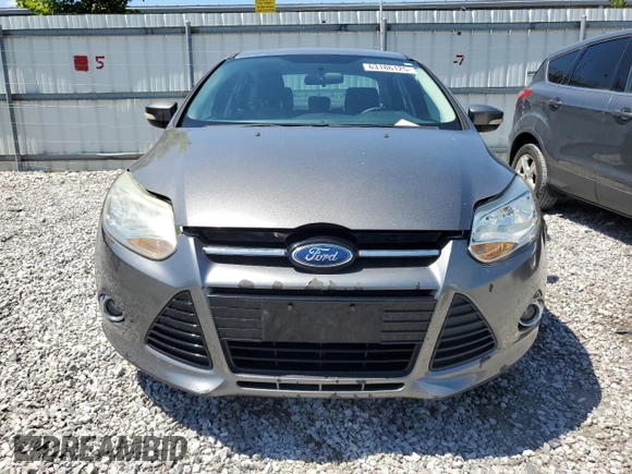 2012 Ford Focus SE z VIN 1FAHP3F23CL328787, wystawiony jako Copart lot #63186125 z przebiegiem 198 629 mil mil oraz Szkoda całkowita • Salvage title. Historia ofert i sprzedaży dostępna na DreamBid. Obrazek 5.