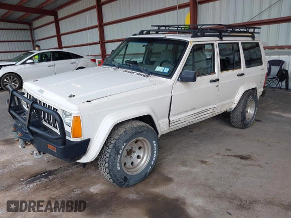 1996 Jeep Cherokee Sport with VIN 1J4FJ68S5TL259449, listed as a IAAI auction lot 42376697 with 72,835 mi miles and . Bid and sale history available at DreamBid. Image 2.