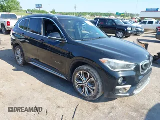 2017 BMW X1 xDrive28i with VIN WBXHT3Z32H4A55987, listed as a IAAI auction lot 42216695 with 90,176 mi miles and . Bid and sale history available at DreamBid. Image 1.