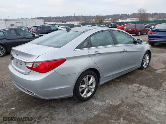 2013 Hyundai Sonata SE with VIN 5NPEC4AC4DH710329, listed as a IAAI auction lot 41849429 with 104,607 mi miles. Bid and sale history available at carsss.com. Image 4.