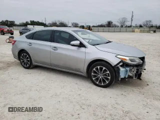 2018 Toyota Avalon Hybrid XLE Plus z VIN 4T1BD1EB3JU060129, wystawiony jako Copart lot #45467145 z przebiegiem 101 266 mil mil oraz Szkoda całkowita • Salvage title. Historia ofert i sprzedaży dostępna na DreamBid. Obrazek 4.
