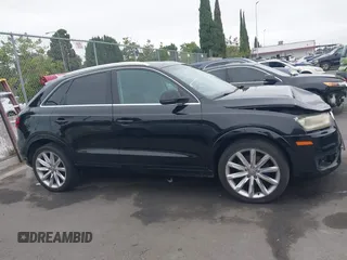 2015 Audi Q3 Premium Plus with VIN WA1EFCFS8FR002771, listed as a IAAI auction lot 42408746 with 115,564 mi miles and . Bid and sale history available at DreamBid. Image 13.