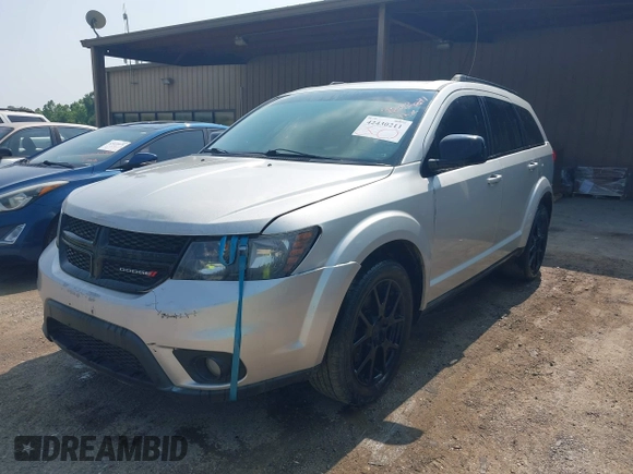 2013 Dodge Journey SXT with VIN 3C4PDDBG3DT661924, listed as a IAAI auction lot 42430211 with Not provided miles and . Bid and sale history available at DreamBid. Image 2.