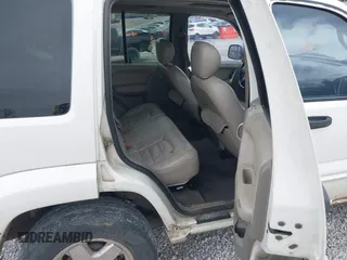 2002 Jeep Liberty Limited with VIN 1J4GL58K32W246480, listed as a IAAI auction lot 41832097 with 300,097 mi miles and . Bid and sale history available at carsss.com. Image 8.