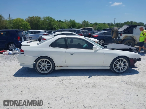 2000 Honda Prelude with VIN JHMBB6245YC007217, listed as a IAAI auction lot 42073430 with 133,492 mi miles and . Bid and sale history available at DreamBid. Image 14.
