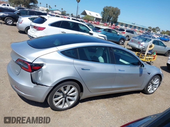 2018 Tesla Model 3 Long Range Battery with VIN 5YJ3E1EB5JF100578, listed as a IAAI auction lot 41959766 with 57,931 mi miles and . Bid and sale history available at DreamBid. Image 13.