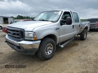 2004 Ford F-250 XL with VIN 1FTNW21L94EE03900, listed as a Copart auction lot 57838765 with 185,837 mi miles and Salvage title. Bid and sale history available at DreamBid. Image 1.