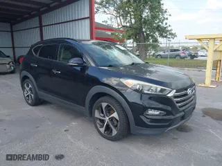 2016 Hyundai Tucson Sport with VIN KM8J33A26GU145958, listed as a IAAI auction lot 42090932 with 117,711 mi miles. Bid and sale history available at carsss.com. Image 1.