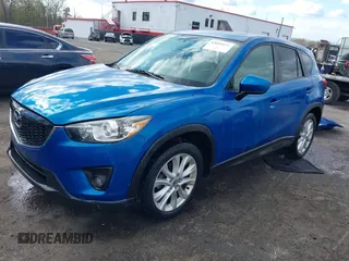 2013 Mazda CX-5 Grand Touring with VIN JM3KE4DE4D0123837, listed as a IAAI auction lot 42031074 with 121,818 mi miles. Bid and sale history available at carsss.com. Image 2.