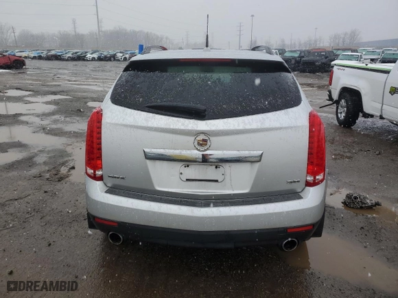 2014 Cadillac SRX with VIN 3GYFNAE37ES652483, listed as a Copart auction lot 47099695 with 169,720 mi miles and Clean Title. Bid and sale history available at carsss.com. Image 6.