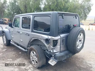 2018 Jeep Wrangler Unlimited Sport S with VIN 1C4HJXDN5JW145340, listed as a IAAI auction lot 42420695 with 92,500 mi miles and . Bid and sale history available at DreamBid. Image 3.
