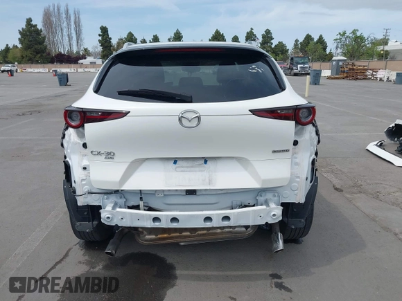 2023 Mazda CX-30 S Carbon Edition with VIN 3MVDMBCM0PM569100, listed as a IAAI auction lot 41978191 with 20,470 mi miles and . Bid and sale history available at DreamBid. Image 17.