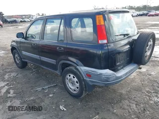 2000 Honda CR-V LX with VIN JHLRD2841YC012945, listed as a IAAI auction lot 41878294 with 306,110 mi miles. Bid and sale history available at carsss.com. Image 3.