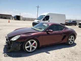 2006 Porsche Cayman S с VIN WP0AB29806U785415, выставлен на аукционе Copart как лот 52888794 с пробегом 106 896 миль миль и Списание • Salvage title. История ставок и продаж доступна на DreamBid. Изображение 1.