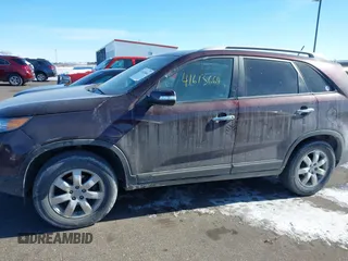 2013 Kia Sorento LX with VIN 5XYKT3A60DG379067, listed as a IAAI auction lot 41613664 with 142,651 mi miles and . Bid and sale history available at carsss.com. Image 14.