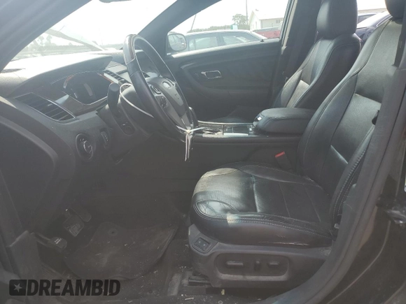 2013 Ford Taurus Limited with VIN 1FAHP2J87DG181051, listed as a Copart auction lot 70630404 with 157,323 mi miles and Salvage title. Bid and sale history available at DreamBid. Image 7.
