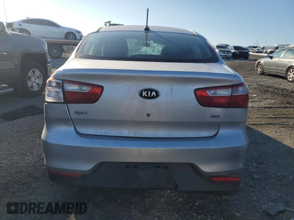 2017 Kia Rio LX z VIN KNADM4A39H6049435, wystawiony jako Copart lot #88899415 z przebiegiem Nie podano mil oraz Szkody całkowita. Historia ofert i sprzedaży dostępna na DreamBid. Obrazek 6.