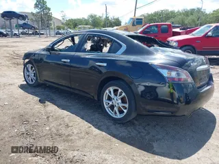 2014 Nissan Maxima S with VIN 1N4AA5AP5EC477030, listed as a IAAI auction lot 42104484 with 116,035 mi miles and . Bid and sale history available at DreamBid. Image 3.