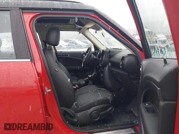 2014 MINI Countryman S z VIN WMWZC5C57EWM17149, wystawiony jako IAAI lot #41246831 z przebiegiem 112 369 mil mil oraz . Historia ofert i sprzedaży dostępna na DreamBid. Obrazek 5.