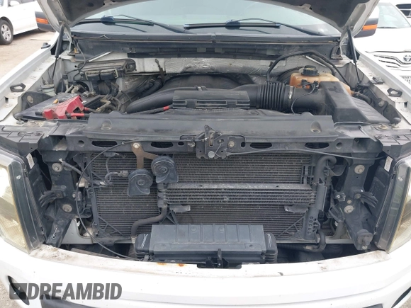 2012 Ford F-150 XL with VIN 1FTFW1CT9CFC24874, listed as a IAAI auction lot 41604316 with 173,526 mi miles. Bid and sale history available at carsss.com. Image 10.