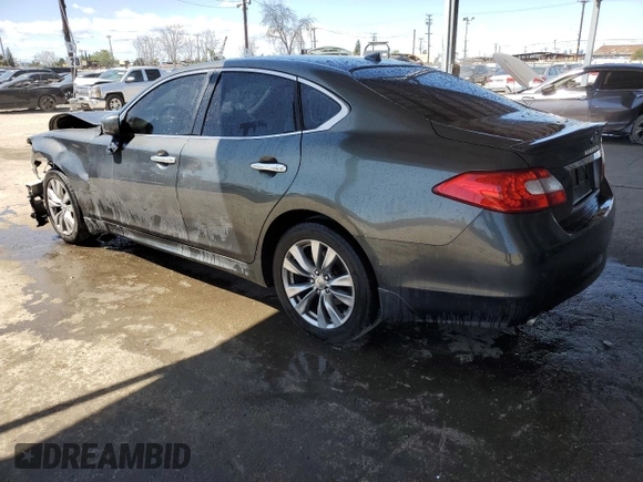 2013 Infiniti M with VIN JN1BY1APXDM510926, listed as a Copart auction lot 51700125 with 111,045 mi miles and Salvage title. Bid and sale history available at DreamBid. Image 2.
