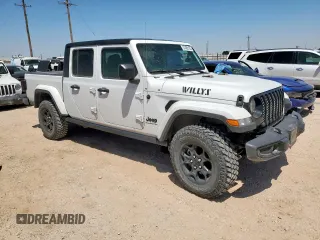 2023 Jeep Gladiator Sport S with VIN 1C6HJTAG4PL564716, listed as a Copart auction lot 57489125 with 20,971 mi miles and Salvage title. Bid and sale history available at DreamBid. Image 4.