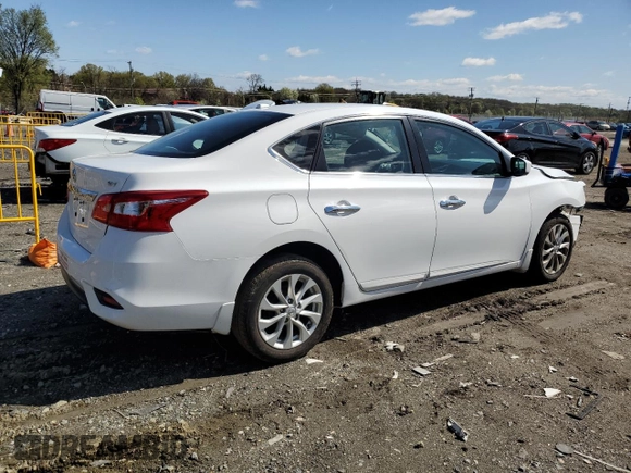 2018 Nissan Sentra SV z VIN 3N1AB7AP2JY262454, wystawiony jako Copart lot #52227965 z przebiegiem 17 091 mil mil oraz Szkoda całkowita • Salvage title. Historia ofert i sprzedaży dostępna na DreamBid. Obrazek 3.