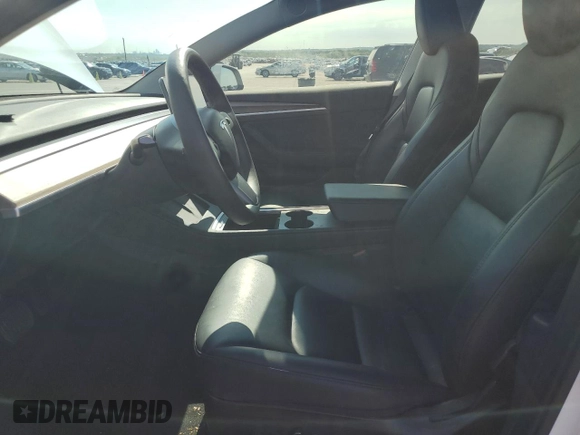 2023 Tesla Model 3 с VIN 5YJ3E1EA4PF506321, выставлен на аукционе Copart как лот 62284254 с пробегом 251 272 миль миль и Списание • Salvage title. История ставок и продаж доступна на DreamBid. Изображение 7.