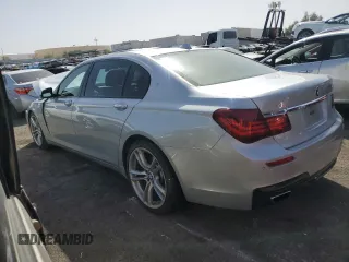 2015 BMW 7 Series 740Li with VIN WBAYE4C52FD947168, listed as a Copart auction lot 71287564 with 103,444 mi miles and Salvage Title. Bid and sale history available at DreamBid. Image 2.