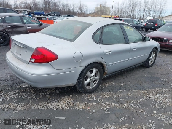 2003 Ford Taurus SES Standard with VIN 1FAFP55253A229632, listed as a IAAI auction lot 41867986 with 154,092 mi miles. Bid and sale history available at carsss.com. Image 4.