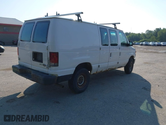 2011 Ford Econoline Cargo Commercial with VIN 1FTNE2EW2BDA58039, listed as a IAAI auction lot 42790590 with 240,510 mi miles and . Bid and sale history available at DreamBid. Image 4.