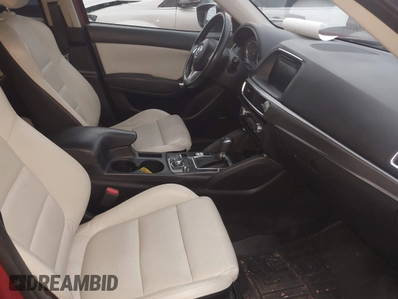 2016 Mazda CX-5 Grand Touring with VIN JM3KE4DY6G0740347, listed as a IAAI auction lot 41101437 with 81,586 mi miles. Bid and sale history available at carsss.com. Image 5.