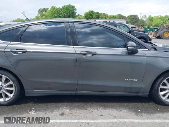 2016 Ford Fusion SE Hybrid с VIN 3FA6P0LU6GR127095, выставлен на аукционе IAAI как лот 42013324 с пробегом 134 474 миль миль и . История ставок и продаж доступна на DreamBid. Изображение 13.