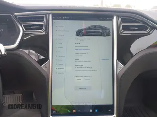 2013 Tesla Model S with VIN 5YJSA1AG5DFP13149, listed as a IAAI auction lot 42116437 with 140,999 mi miles. Bid and sale history available at carsss.com. Image 19.