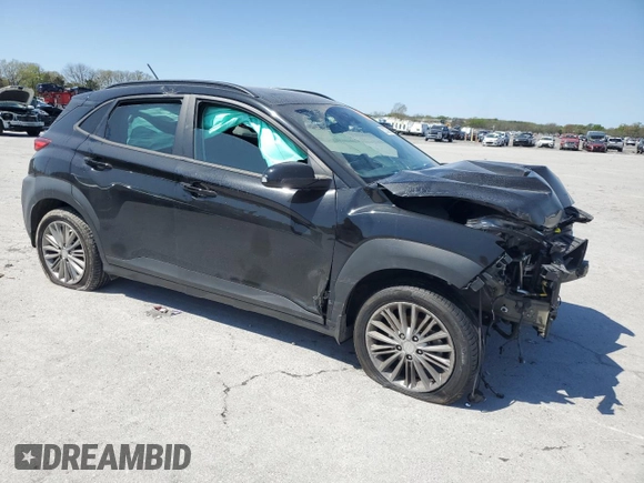 2021 Hyundai Kona SEL with VIN KM8K22AA7MU602863, listed as a Copart auction lot 52329685 with 83,551 mi miles and Salvage Title. Bid and sale history available at carsss.com. Image 4.