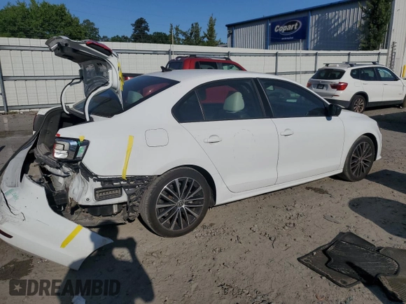 2015 Volkswagen Jetta SE с VIN 3VWD17AJ4FM328801, выставлен на аукционе Copart как лот 52684145 с пробегом 140 860 миль миль и Списание • Salvage title. История ставок и продаж доступна на DreamBid. Изображение 3.
