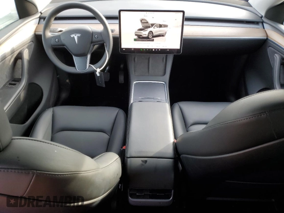 2023 Tesla Model Y Long Range with VIN 7SAYGDEE5PA125887, listed as a Copart auction lot 43188655 with 31,472 mi miles and Salvage Title. Bid and sale history available at DreamBid. Image 8.