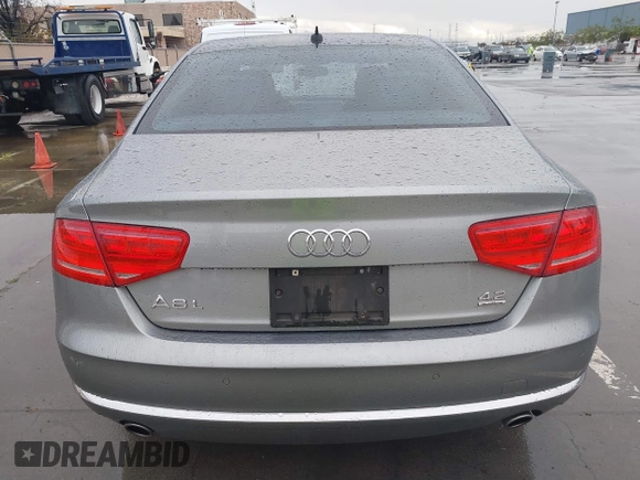 2012 Audi A8 z VIN WAURVAFD5CN008320, wystawiony jako IAAI lot #41508237 z przebiegiem 183 398 mil mil oraz . Historia ofert i sprzedaży dostępna na DreamBid. Obrazek 16.
