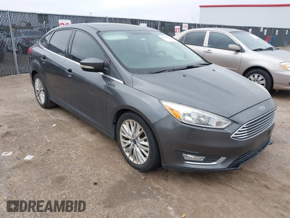 2018 Ford Focus Titanium with VIN 1FADP3J29JL232911, listed as a IAAI auction lot 41524078 with 90,764 mi miles and . Bid and sale history available at DreamBid. Image 6.