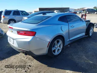 2017 Chevrolet Camaro 1LT with VIN 1G1FB1RX1H0153775, listed as a IAAI auction lot 41678960 with 138,040 mi miles. Bid and sale history available at carsss.com. Image 4.