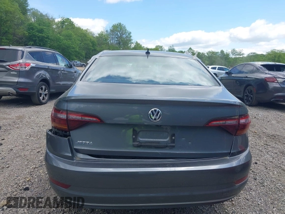 2019 Volkswagen Jetta S z VIN 3VWC57BUXKM121316, wystawiony jako IAAI lot #42290107 z przebiegiem 117 371 mil mil oraz . Historia ofert i sprzedaży dostępna na DreamBid. Obrazek 17.