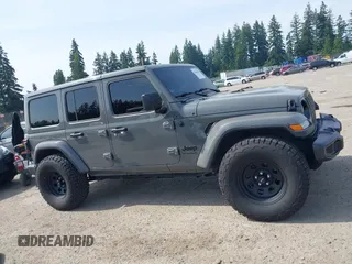 2019 Jeep Wrangler Unlimited Sahara with VIN 1C4HJXEG6KW644553, listed as a IAAI auction lot 42465842 with 40,226 mi miles and . Bid and sale history available at DreamBid. Image 14.