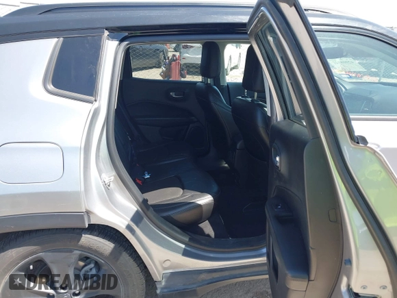 2018 Jeep Compass Latitude with VIN 3C4NJDBB3JT304145, listed as a IAAI auction lot 42008241 with 52,642 mi miles and . Bid and sale history available at DreamBid. Image 8.