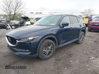 2021 Mazda CX-5 Touring with VIN JM3KFBCM1M1336457, listed as a IAAI auction lot 42034330 with 39,910 mi miles. Bid and sale history available at carsss.com. Image 16.