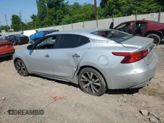 2017 Nissan Maxima SV with VIN 1N4AA6AP4HC418058, listed as a Copart auction lot 60500965 with 154,308 mi miles and Salvage title. Bid and sale history available at DreamBid. Image 2.