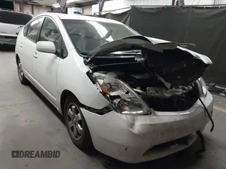 2005 Toyota Prius z VIN JTDKB20UX53096548, wystawiony jako IAAI lot #42269342 z przebiegiem 299 999 mil mil oraz . Historia ofert i sprzedaży dostępna na DreamBid. Obrazek 1.